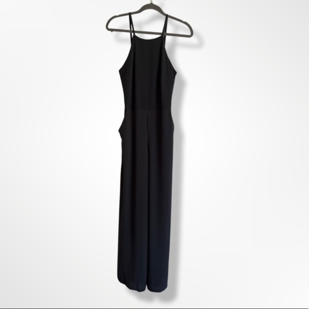 Grey Jumpsuit with pockets and tie back detail Size M